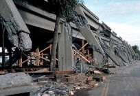 The collapsed Cypress Street Viaduct in Oakland, California due to an earthquake in 1989